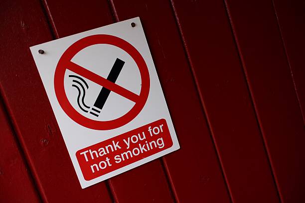 Clean outdoor park with a “Thank You for No Smoking” sign