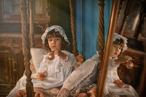 Soft pastel lifestyle portrait representing babydollkaila aesthetic with cozy fashion and warm natural lighting indoors