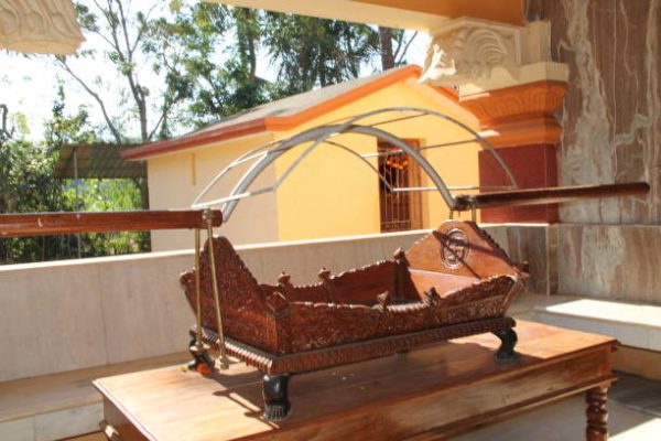 Traditional village scene representing dharapathi leadership and community unity