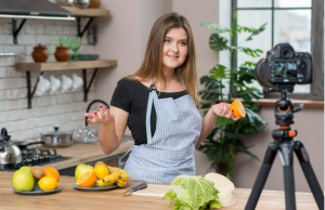 Modern home chef kitchen setup with organized prep station, stainless steel cookware, bright task lighting, and professional cooking equipment.